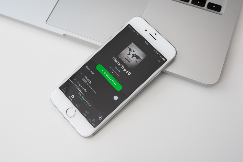 Shutterstock_625286417 KAUNAS, LITHUANIA - APRIL 20, 2017: Control music at home with Spotify app on mobile. Spotify service developed by startup Spotify AB in Stockholm, Sweden