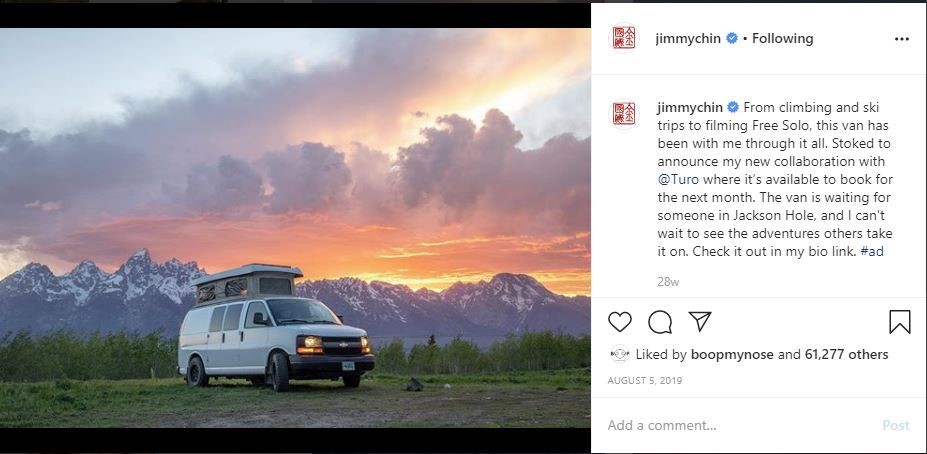 Jimmy chin white truck in front of mountains and a sunset