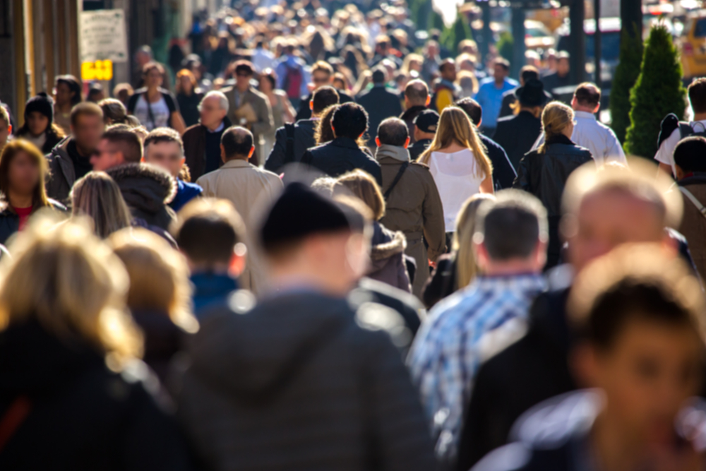 Shutterstock_160438778  Anonymous crowd of people walking on a busy New York City street