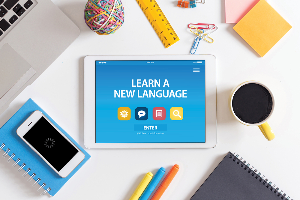 Shutterstock_526852489 LEARN A NEW LANGUAGE CONCEPT ON TABLET PC SCREEN