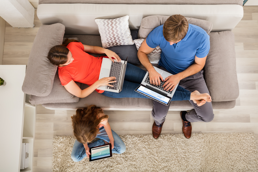 Shutterstock_502228213 Family Using Tablet And Computers