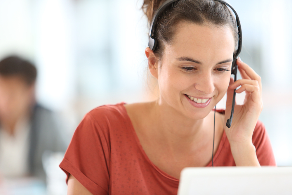 Shutterstock_161513456 Portrait of beautiful customer service representative