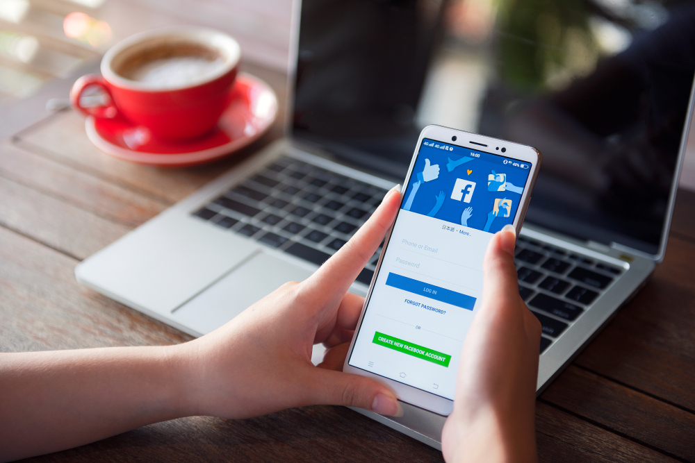 Shutterstock_1404670514 Bangkok Thailand : 01 / May / 2019 Facebook social media app logo on log-in, sign-up registration page on mobile