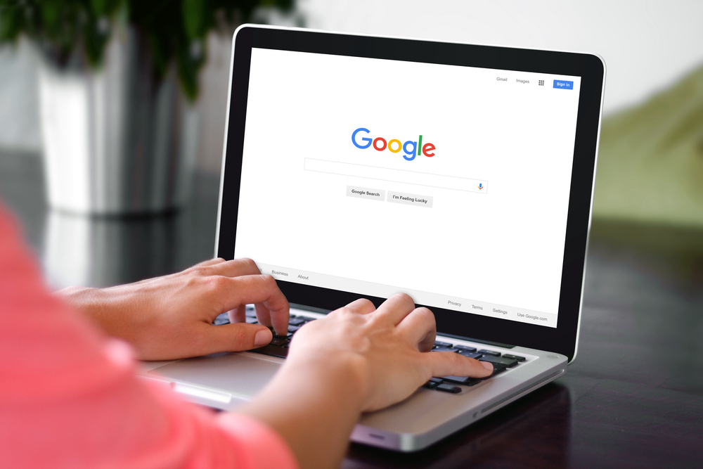 Shutterstock_344865374 BEKASI, INDONESIA - NOVEMBER 29, 2015: A woman is typing on Google search engine from a laptop. Google is the biggest Internet search engine in the world.