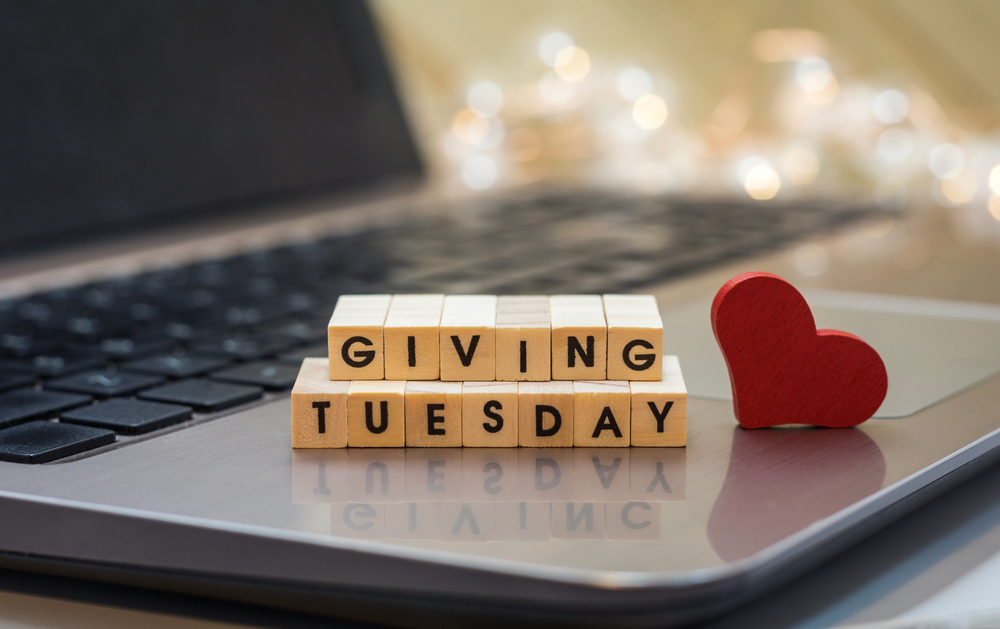 Shutterstock_1818963800 GIVING TUESDAY letter blocks concept on laptop keyboard